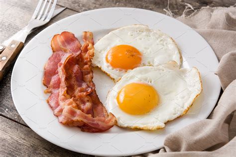 Fried Eggs And Bacon High Quality Food Images Creative Market