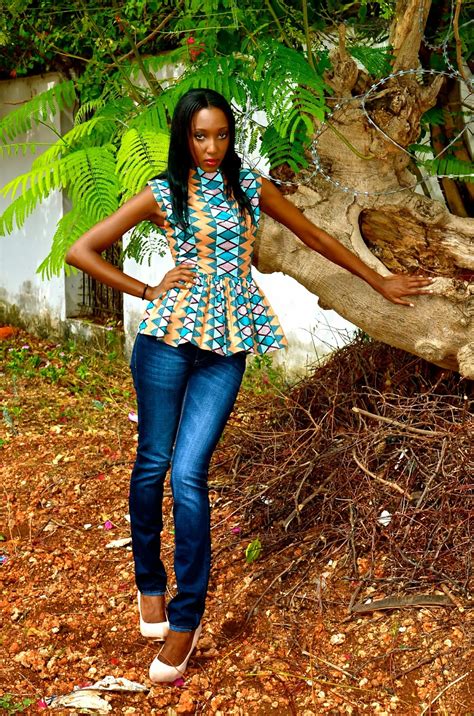 Kikis Fashion African Print Pull Neck Peplum Top And Blue Jeans Available At Kikis Fashion