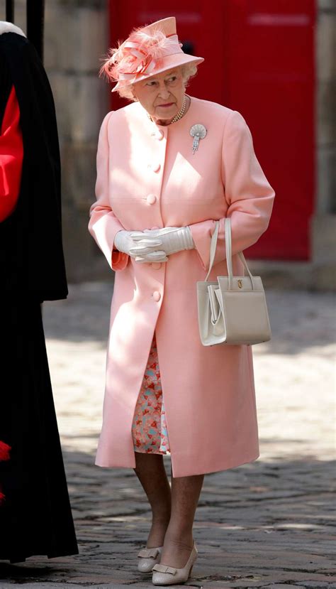 Queen Elizabeths Best Outfits Her Most Iconic Looks Of All Time