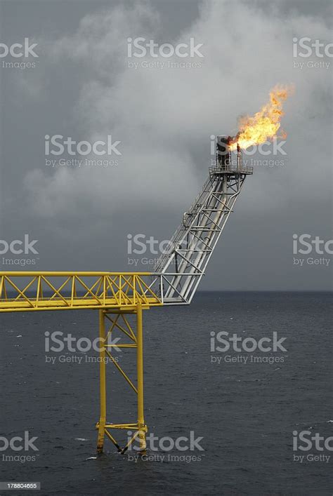 Flare Boom Nozzle And Fire On Offshore Oil Rig Stock Photo Download
