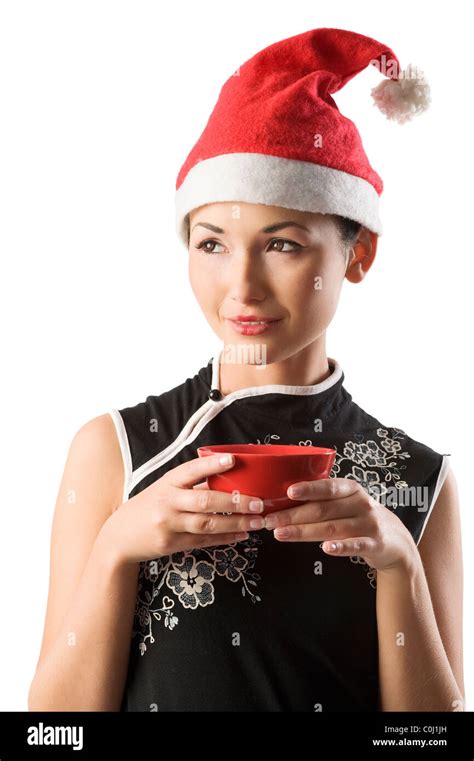 Asian Santa Claus Girl Holding Traditional Red Chinese Cup For Rice