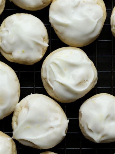 Once cooled, cut into bars (makes approximately 24 squares). Soft Cream Cheese Lemon Cookies | Cookies and Cups