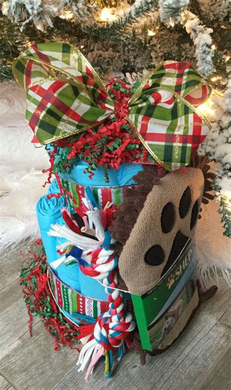 Check out our dog gift basket selection for the very best in unique or custom, handmade pieces from our dog toys shops. Wee wee pad cake, Christmas dog gift, new puppy gift, dog ...