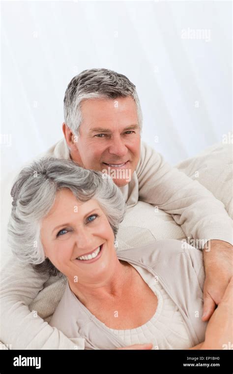Mature Woman Hugging Her Husband Stock Photo Alamy
