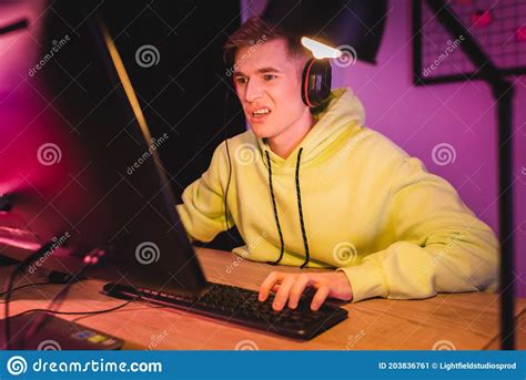 Concentrated Young Gamer In Headset Play Stock Image Image Of