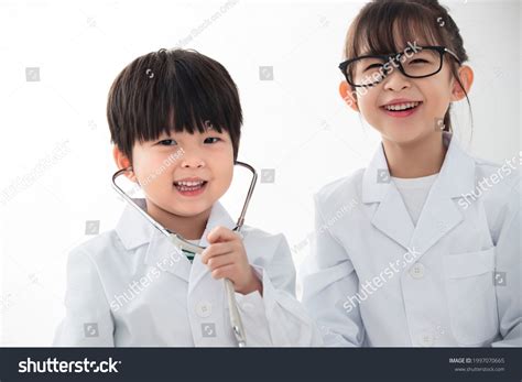 Happy Children Playing Dressed Doctors Stock Photo 1997070665