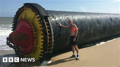 Giant Pipes Wash Up On Norfolk Beaches