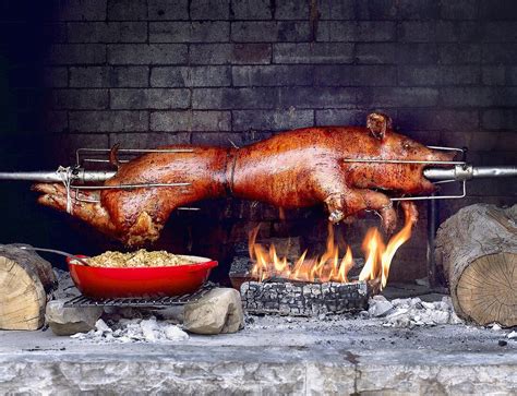 Whole Roasted Pig On Spit With White License Images 689038 Stockfood