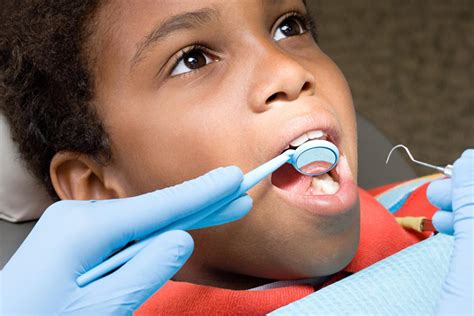 School dental screening programmes for oral health | Cochrane Oral Health