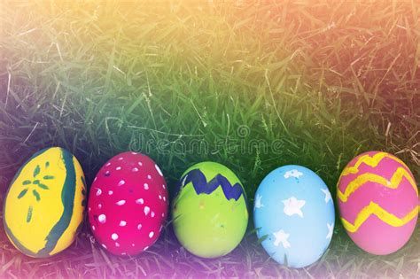 Colorful Easter Eggs Decorated With Flowers In The Grass Stock Image
