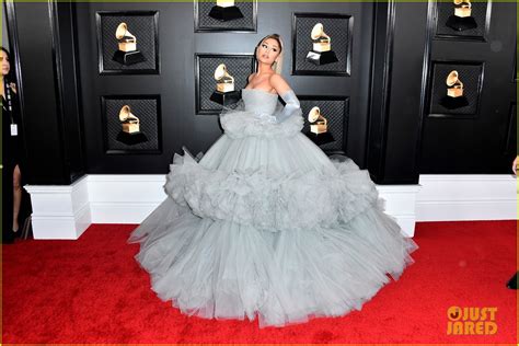 Grande's first tulle cinderella dress—a custom giambattista valli look—caught everyone's attention. Ariana Grande Has a Princess Moment on Grammys 2020 Red ...