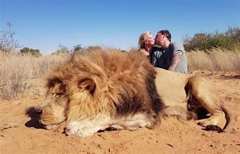 Sick Photo Shows Trophy Hunting Couple Kiss Over Corpse Of Magnificent