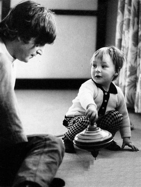 ♡♥john Lennon Sits With His First Born Son Julian Who Plays With A