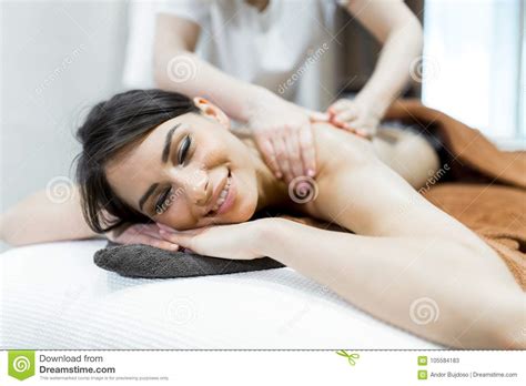 Beautiful Woman Lying On A Massage Table And Relaxing