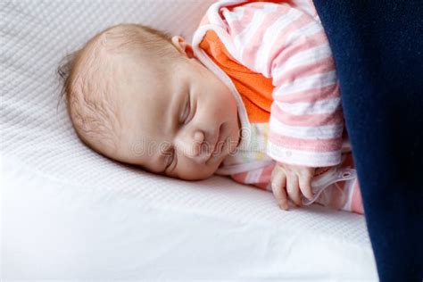 Portrait Of Cute Adorable Newborn Baby Girl Sleeping Stock Image