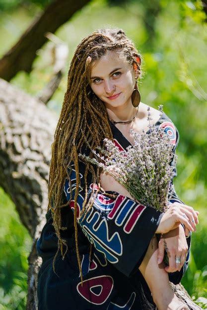 Premium Photo Beautiful Girl With Dreadlocks Dressed Hippie Styleposes Outdoors