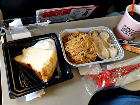 Most popular airline last month. Review of Air Asia flight from Kuching to Singapore in Economy