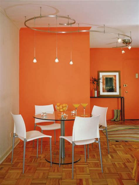 To experiment with orange, try contemporary artworks and decorative objects, as demonstrated in this room by charlie & co. Orange Design Ideas | HGTV