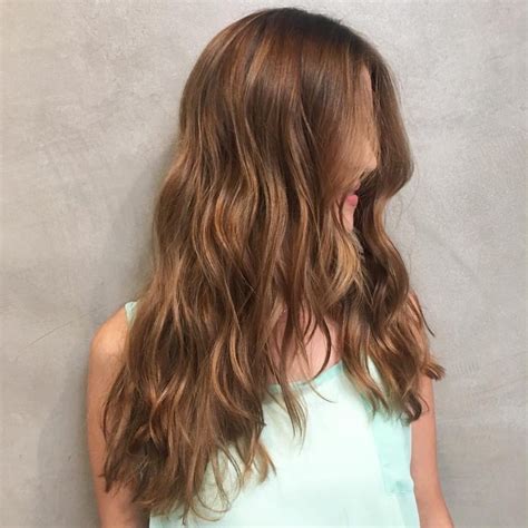 Long Wavy V Cut Layers On Warm Light Brown Hair The Latest Hairstyles