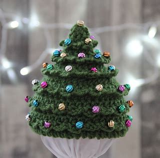 Christmas ornament free crochet hat pattern. Ravelry: Christmas Tree Beaded Hat pattern by Jocelyn Sass