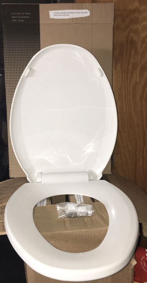 American Standard White Plastic So Close Elongated Toilet Seat Cover