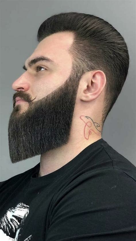 Bearded Man With Tattoo After A Haircut 𝗕𝗮𝗿𝗕𝗲𝗮𝗿𝗱𝘀 𝗕𝗮𝗿𝗯𝗲𝗿 And 𝗕𝗲𝗮𝗿𝗱