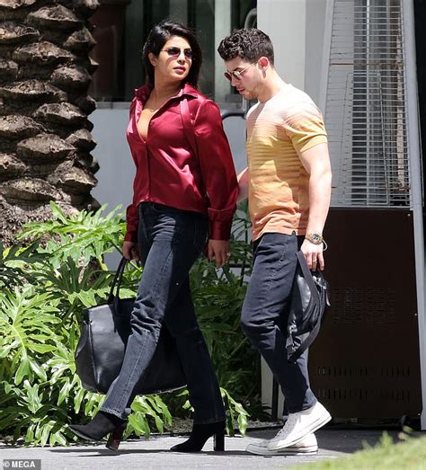 Priyanka Chopra Looks Relaxed In A Loose Fitting Red Blouse