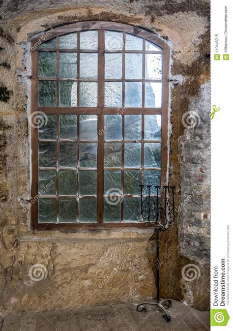 The Window In The Stone Wall Of The Castle Rock Stock Image Image Of