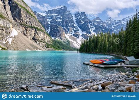 Turquoise Waters Of Beautiful Moraine Lake Snow Covered Rocky