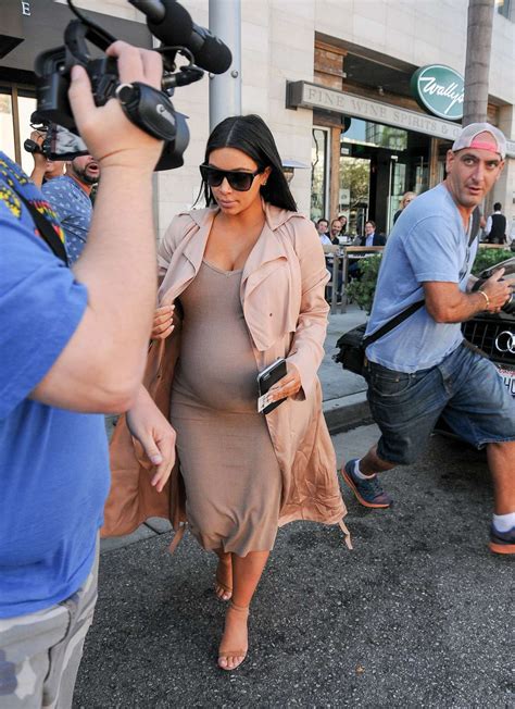 Pregnant Kim Kardashian In Tight Dress 02 Gotceleb