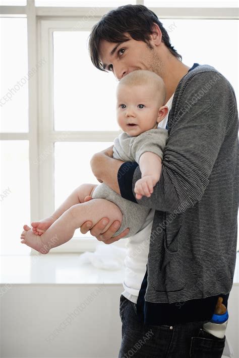 Father Holding Baby Boy Stock Image F003 9659 Science Photo Library