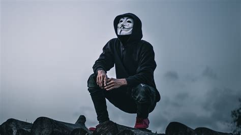 Black mask hoodie boy in city 4k. Download wallpaper 2560x1440 man, mask, anonymous, hood ...
