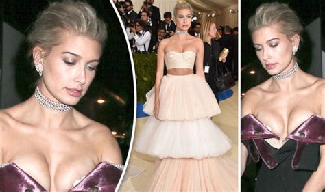 hailey baldwin awkwardly flashes nipple pasty as her cleavage spills out of velvet dress