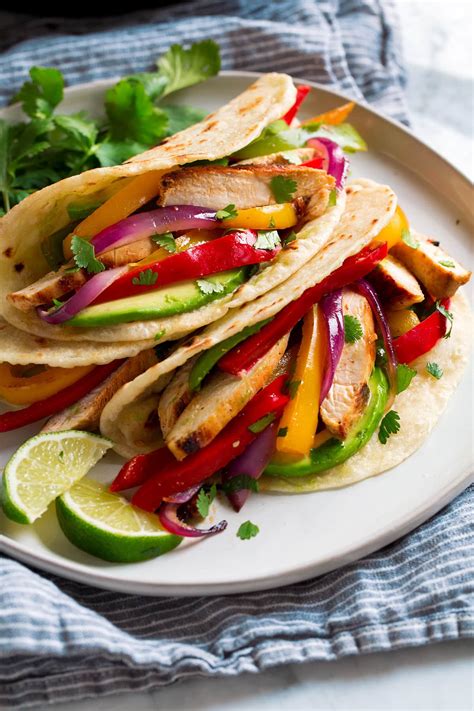 A squeeze of fresh lime adds a punch of flavor and the chicken fajitas are served with warm tortillas and toppings. Chicken Fajitas - Cooking Classy