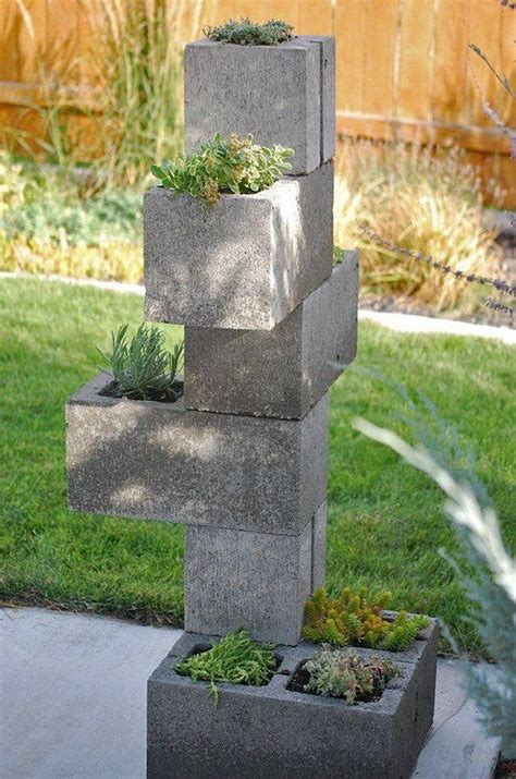 Cinder block walls have to to be constructed carefully and with the necessary reinforcement to account for a solid installation. Vertical garden from cinder blocks | DIY projects for ...