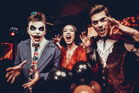 Young People In Costumes Celebrating Halloween Stock Image Image Of
