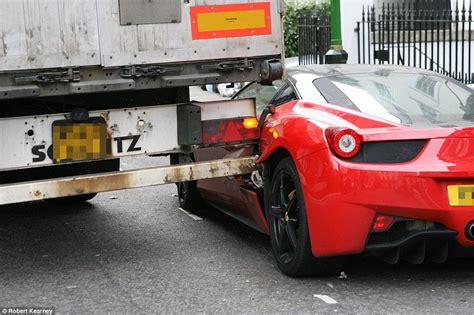 Leaving cop with broken toes. Truck Opens Ferrari 458 Italia Like a Can of Sardines ...