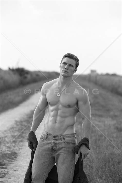 Muscular Man Without A Shirt On A Dirt Road In The Everglades Rob