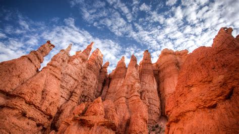 Download Wallpaper 2560x1440 Rocks Canyon Sky Clouds Nature Bottom