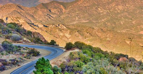 Driving, the act of controlling a vehicle. Mulholland Drive, Los Angeles | Roadtrippers