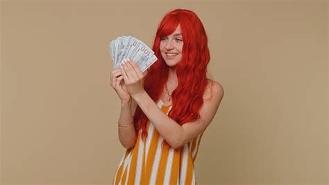 Redhead Girl Holding Cash Money Dollar Celebrate Dance Success Business