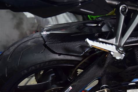 We use functional cookies to allow our website to function properly and. YAMAHA R1 2015-2020 Carbon Fiber Rear Hugger