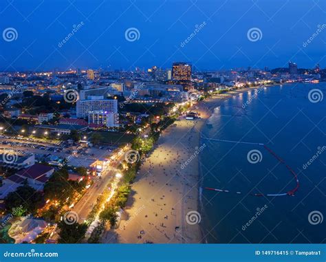 Aerial View Of Boats In Pattaya Sea Beach At Night And Urban City