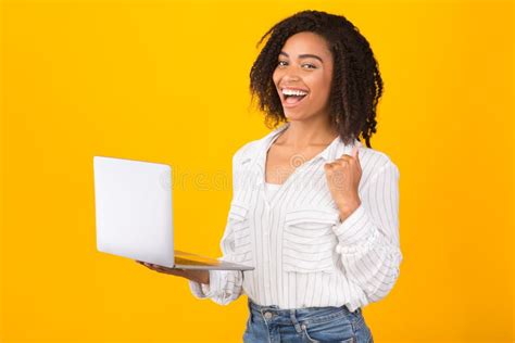 Portrait Of Excited Black Girl Holding Laptop Stock Photo Image Of Friendly Casual