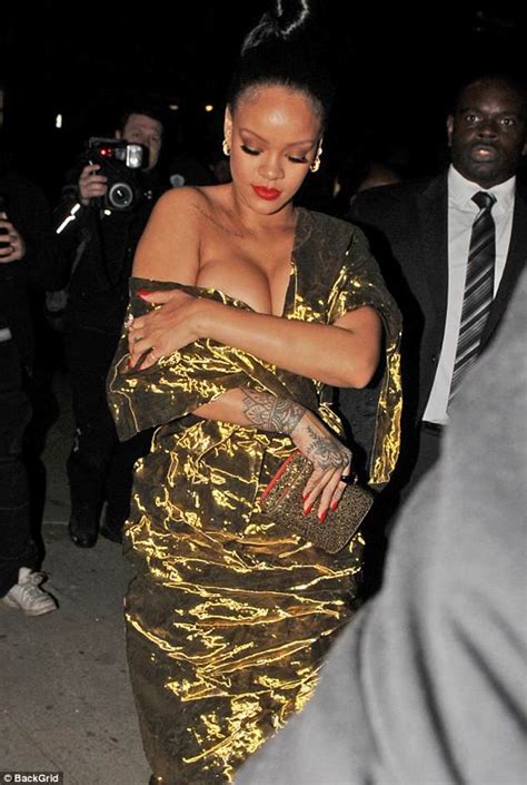 rihanna spills out of plunging gown as she turns heads at ocean s 8 premiere afterparty in