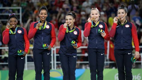 usa women s gymnastics team romps to gold in rio