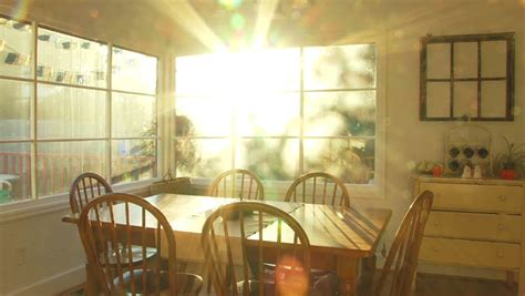 Bright Sunset Shines Through Window Of Dining Room At House Time Lapse