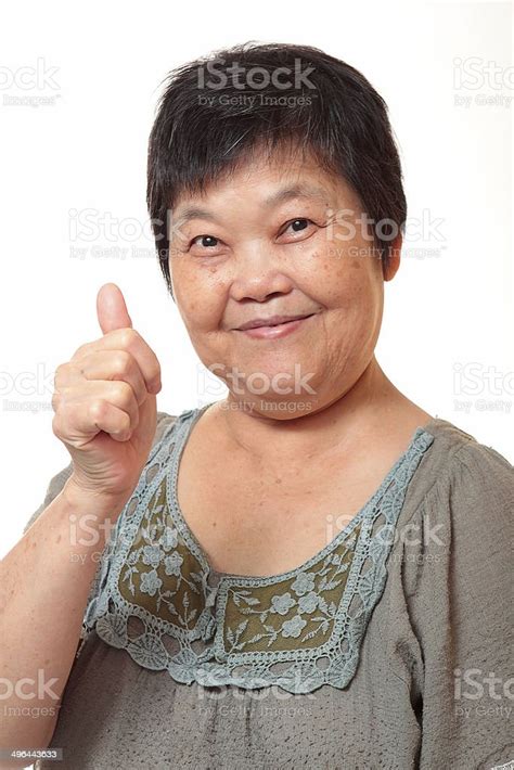 Woman Showing Thumbs Up Sign Stock Photo Download Image Now Asian