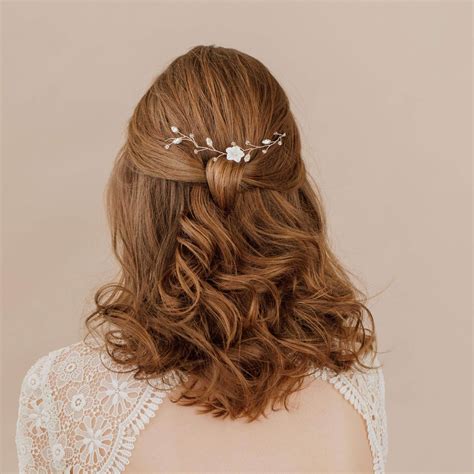 We've gone back to easy and breezy wedding hair here and this look screams bohemian 9. Silver leaf and pearl wedding hair vine - 'Istria' | Britten