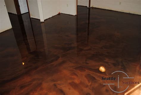 These floors are stunning to look at and impossible to replicate, meaning, your floor will be a beautiful piece of art. A designer metallic epoxy basement floor done in Deep ...